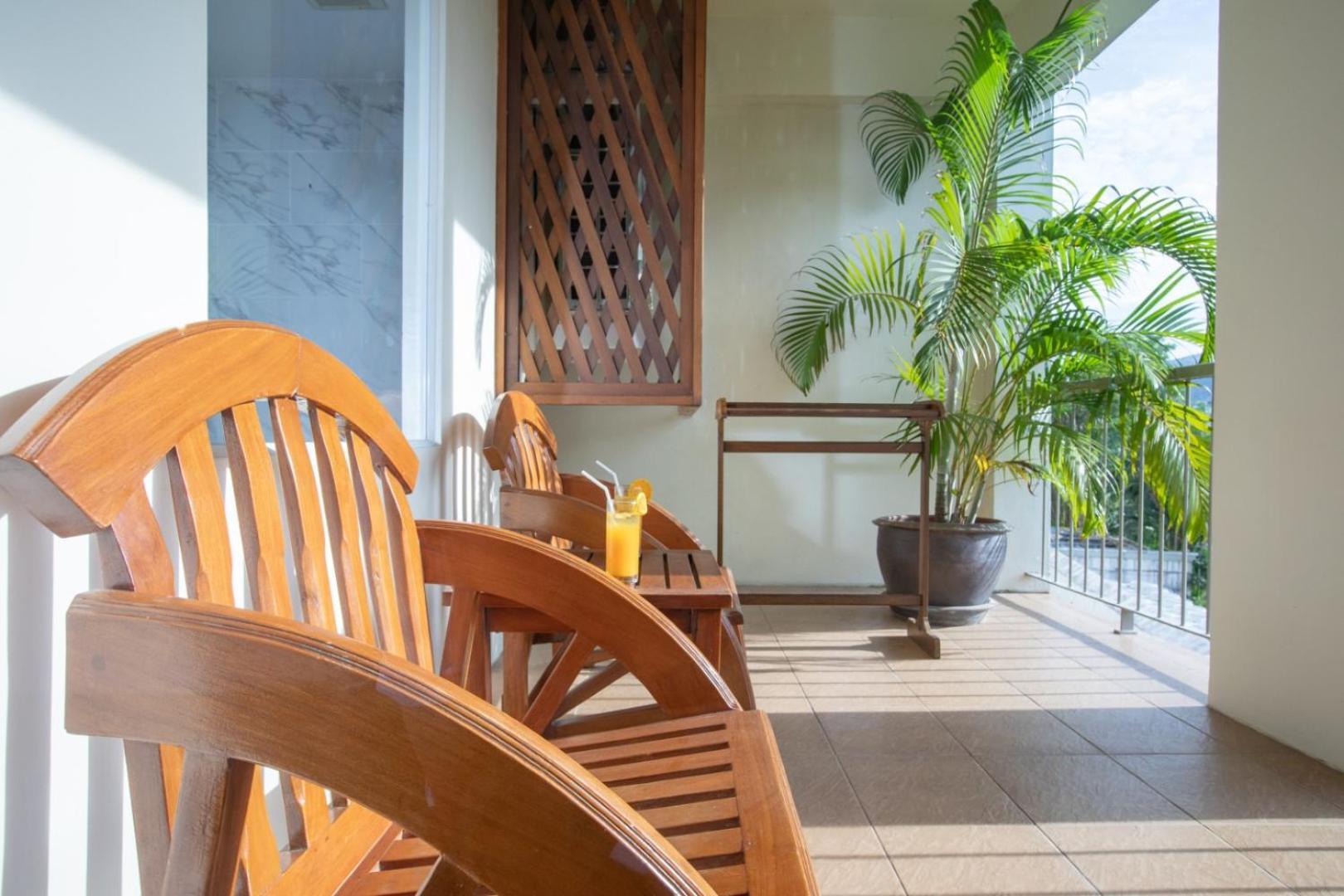 Orchid Garden Hotel Patong Bagian luar foto